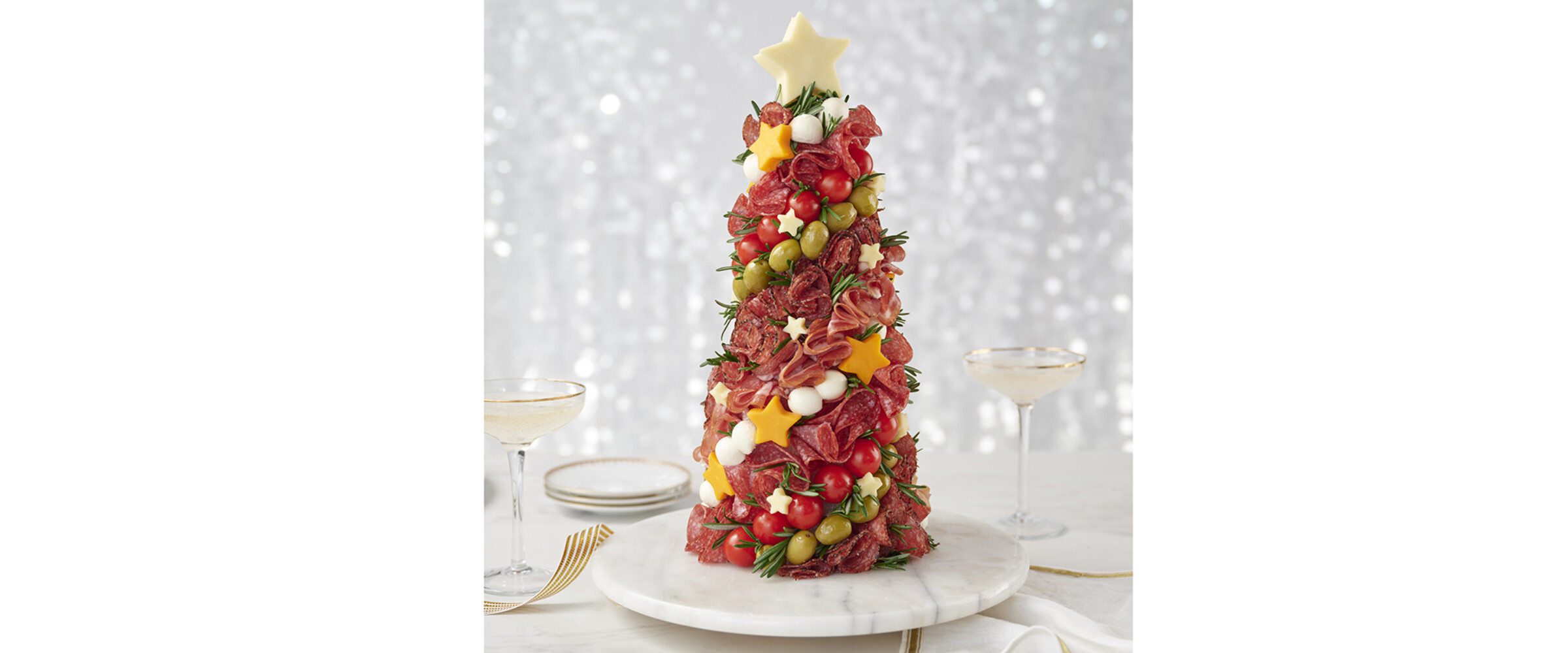 charcuterie on a Styrofoam cone in the shape of a christmas tree