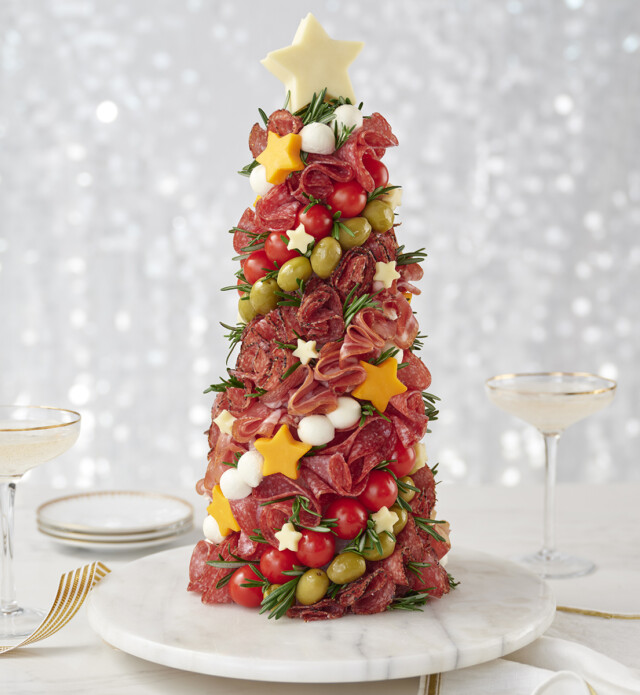 charcuterie on a Styrofoam cone in the shape of a christmas tree